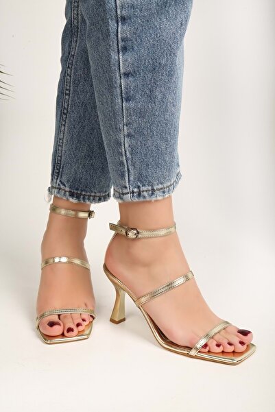 Shoeberry Dámské světle zlaté metalické boty na podpatku Louros