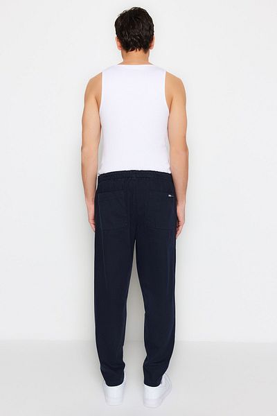Trendyol Collection Sötétkék, normál szabású gumírozott derékú gabardin nadrág TMNSS23PL00033