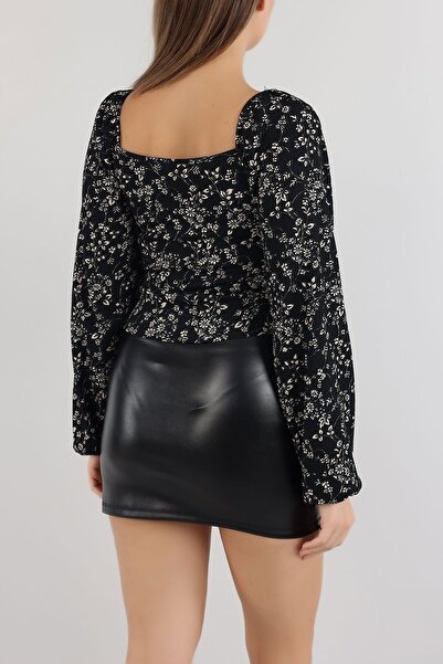 bayansepeti Faux Leather Fabric Design Black Mini Skirt with Elastic Waist Slit 222643