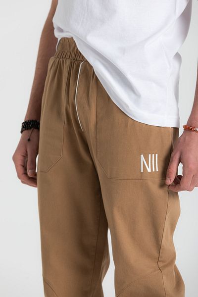 RUBYSTARS Mustard Leg Elastic Gabardine Pocket Embroidery Detail Jogger Pants