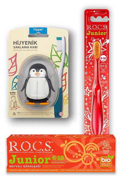 R.O.C.S. R.o.c.s 6-12 مجموعة العناية بالبطريق - معجون أسنان قوس قزح + فرشاة أسنان جونيور حمراء + حاوية البطريق