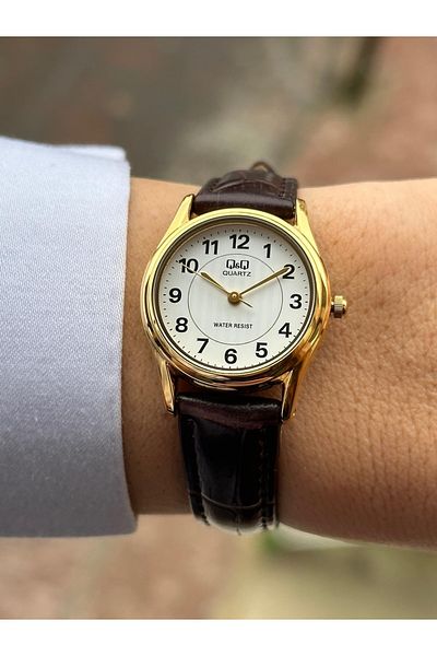 Q&Q Numeral White Dial Elegant and Stylish Women's Wristwatch