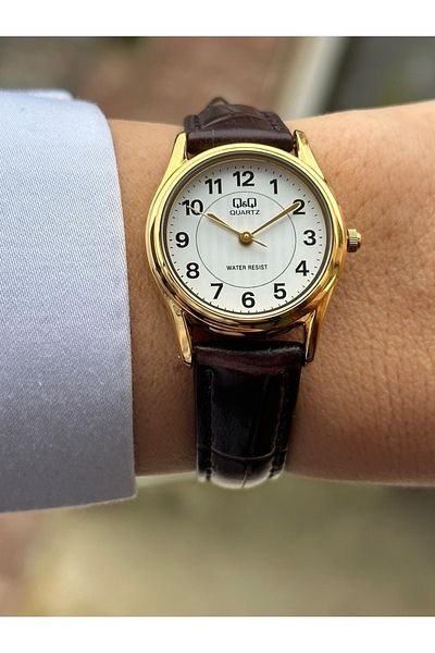 Q&Q Numeral White Dial Elegant and Stylish Women's Wristwatch