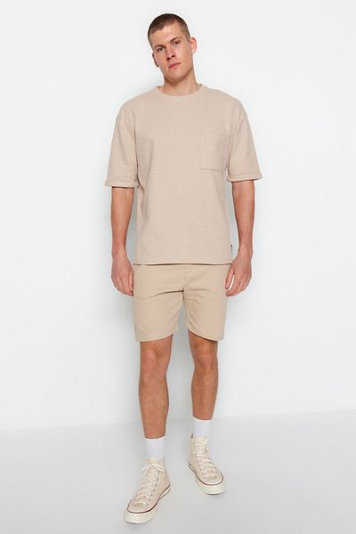 Trendyol Collection Béžové oversize tričko Crew Neck – kapsa a detail štítku Tmnss23Ts00077