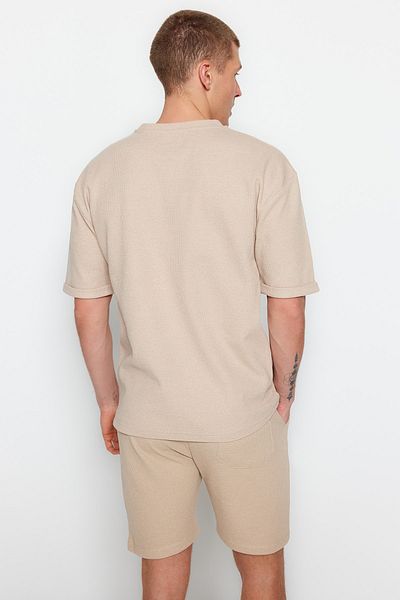 Trendyol Collection Béžové oversize tričko Crew Neck – kapsa a detail štítku Tmnss23Ts00077