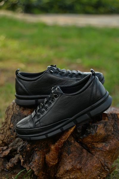 Dunlop black deals canvas shoes