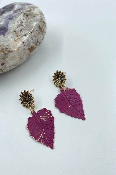 Cocopelli Concept أقراط ورقة الزنجار