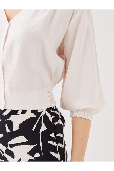 LC Waikiki Γυναικεία μακρυμάνικη μονόχρωμη μπλούζα με λαιμόκοψη V