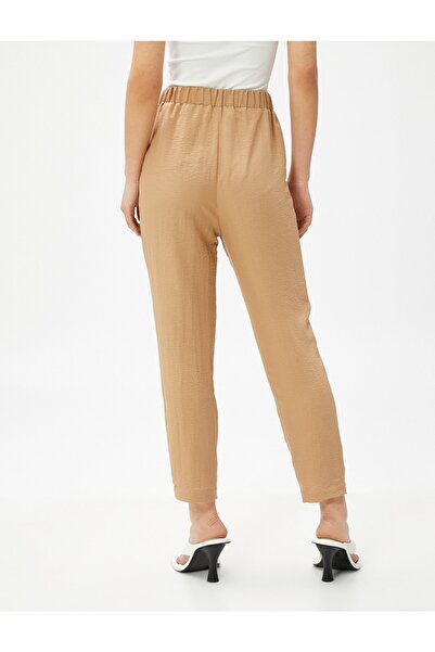 Koton Comfortable Pants with Pockets and Tied Waist