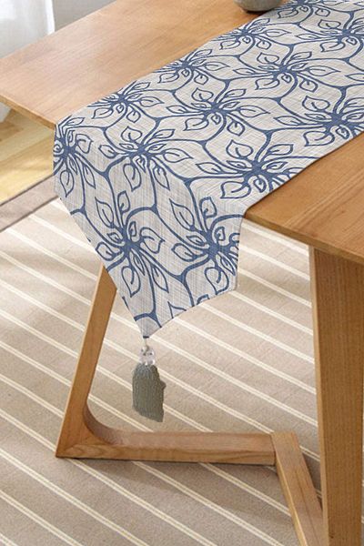 Realhomes Chenille Triangle Runner with Geometric Floral Motif and Tassels on Gray Background
