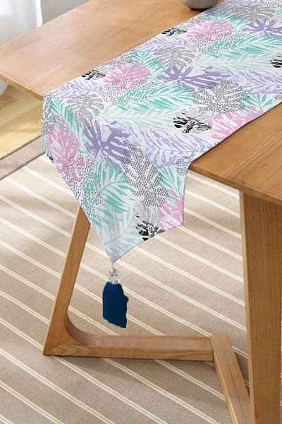 Realhomes Alerg triunghi modern cu smocuri de chenille cu desen de frunze colorate pe fundal alb