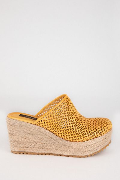 Elile Shoes Papuci închiși cu toc din piele naturală din iută