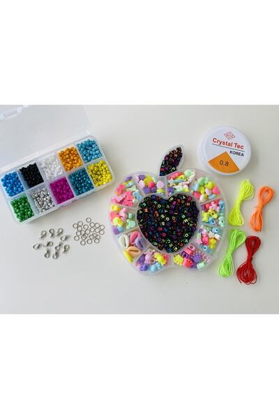 yağmur gökçe Br. 161 Kutija sa jabukama, dečije figure i perle sa slovima i 1...