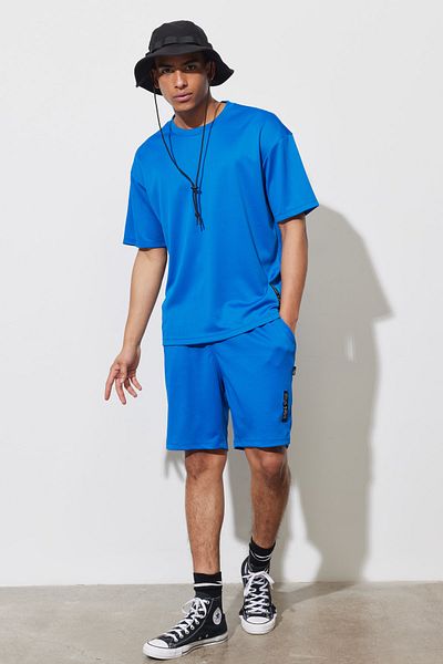 AC&Co / Altınyıldız Classics Pánské triko Saks Blue Loose Fit Crew Neck s měkkým texturovaným sportovním tričkem
