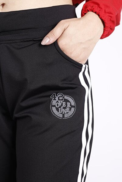 Azıcık Akıllı Γυναικείο μαύρο λευκό ριγέ λεπτό υφασμάτινο καλοκαιρινό παντελόνι με τσέπες 21kesaakt2