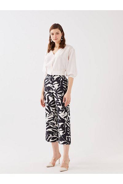 LC Waikiki Gemusterte Damen-Caprihose mit elastischem Bund