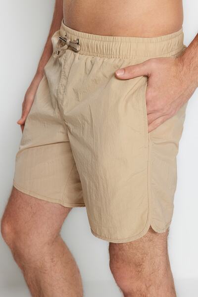 Trendyol Collection Kamelfarbene Seeshorts in Standardlänge - TMNSS23DS00028
