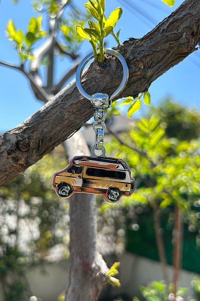 CoNotes Orange Keychain with Caravan Design