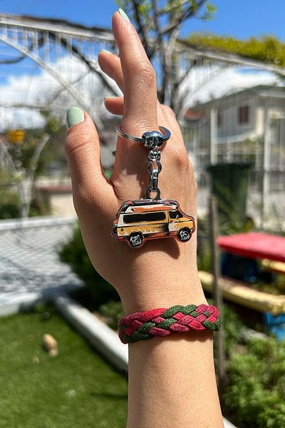 CoNotes Orange Keychain with Caravan Design