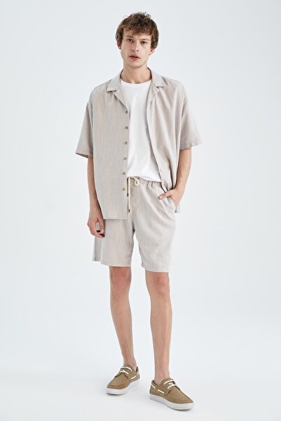 DeFacto Oversize Fit nyitott gallérú vászon megjelenésű rövid ujjú ing