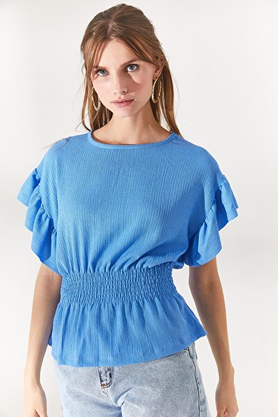 Olalook Dámska modrá netopieria blúzka s elastickým pásom a volánikovými rukávmi BLZ-19002201