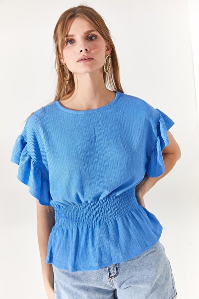 Olalook Dámska modrá netopieria blúzka s elastickým pásom a volánikovými rukávmi BLZ-19002201