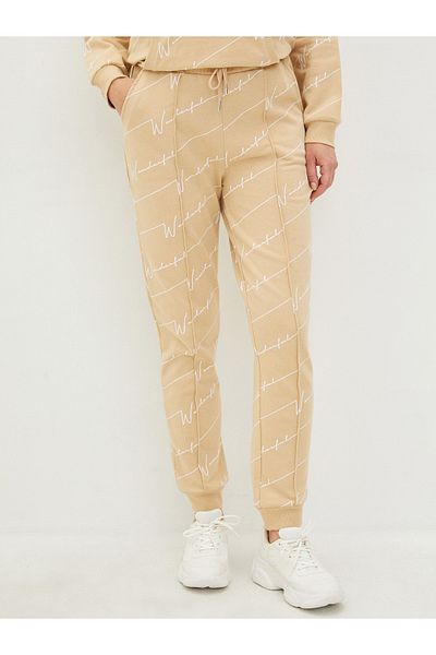 LC Waikiki Jogginghose aus bedruckter Baumwolle für Schwangere mit elastischem Bund und Taschendetail