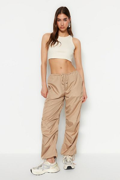 Trendyol Collection Beige High Waist Parachute Fabric Woven Trousers TWOSS23PL00317