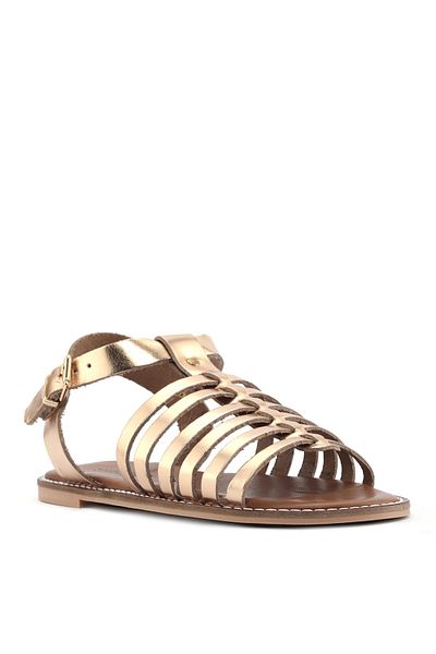 Sole Sisters Flache Gladiator-Sandalen aus echtem Leder in Gold – Serim