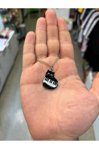 Kuzgunshop Piyanoya Sarılan Kedi Figür Kolye
