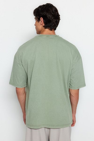 Trendyol Collection Grünes Oversize-T-Shirt aus Baumwolle mit blasser Optik - TMNSS23TS00153