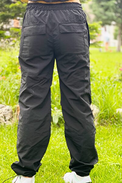 fmnbutik kız çocuk paraşüt kumaş ayarlanabilir lastikli rahat yüksek bel bol cep detay kesim pantolon