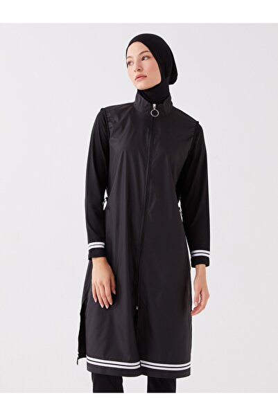 LC Waikiki Το ρυθμιζόμενο πώμα στη μέση εμποδίζει το μαγιό σας να ανέβει.