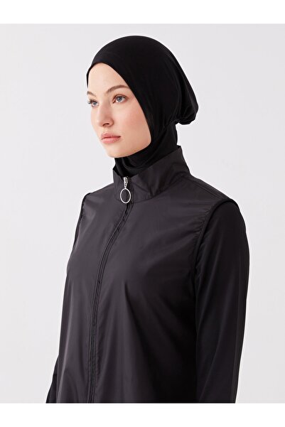 LC Waikiki Το ρυθμιζόμενο πώμα στη μέση εμποδίζει το μαγιό σας να ανέβει.