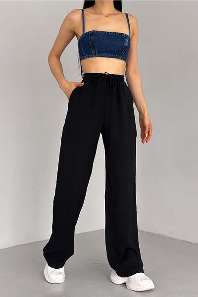 FEMELLE Schwarze Damen-Hose der neuen Saison mit doppelten Taschen und Kordelzug in der Taille aus Modalstoff mit weitem Bein