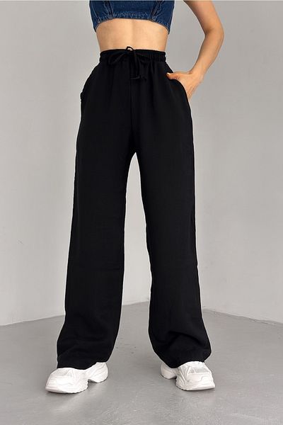 FEMELLE Schwarze Damen-Hose der neuen Saison mit doppelten Taschen und Kordelzug in der Taille aus Modalstoff mit weitem Bein