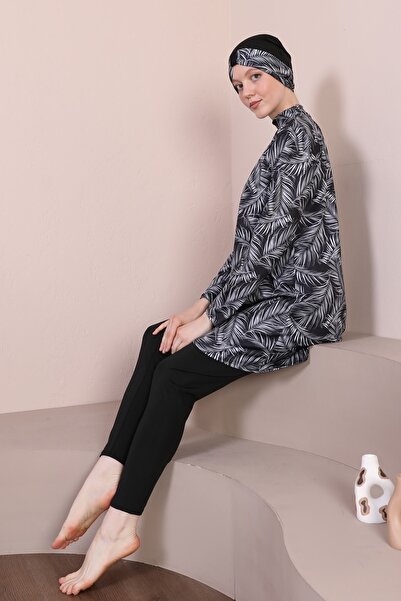 ICOLEXİN Μαγιό με μανίκια στον ώμο (Μαύρο-Λευκό) Μοντέλο Τεσεττούρ