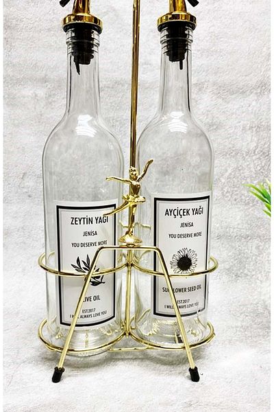Jenisa Transparent Bottle Oil Pot with Gold Colored Ballerina Accessory and Gold Stand