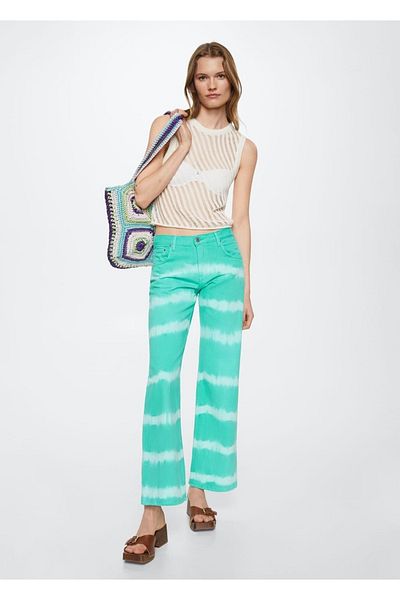 MANGO Woman Jeans mit weitem Bein und Batikmuster