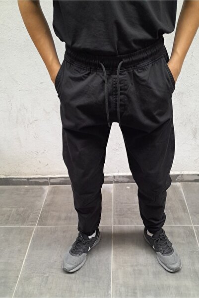 Butik Karaca بنطلون جينز رجالي من جاغر باتر فيت ساتان جبردين رفيع