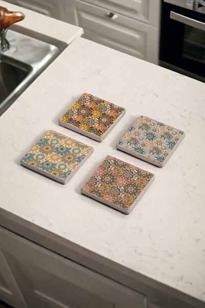 Baumatelier مجموعة مكونة من 4 قطع من قواعد الأكواب المصنوعة من حجر الترافرتين الطبيعي بنمط زهرة البلاط