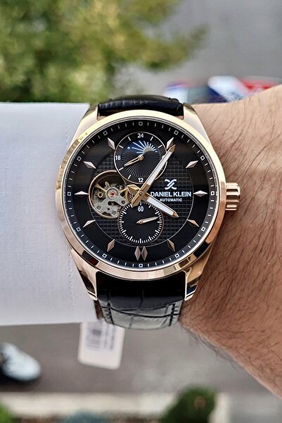Daniel Klein İskelet Kasası Bakır Renk 2 Yıl Garantili Takvimli Göstergeleri Aktif Otomatik Erkek Kol Saati