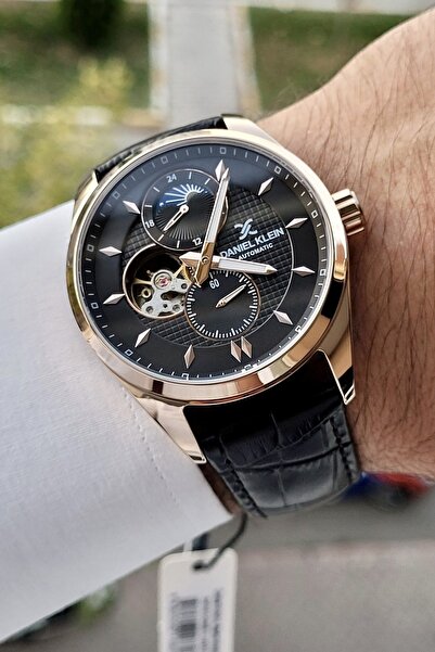 Daniel Klein İskelet Kasası Bakır Renk 2 Yıl Garantili Takvimli Göstergeleri Aktif Otomatik Erkek Kol Saati