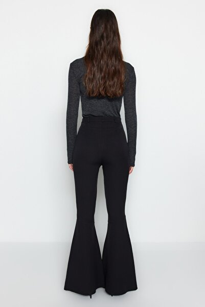 Trendyol Collection Tkané kalhoty Black Flare Flare Leg TWOAW24PL00038