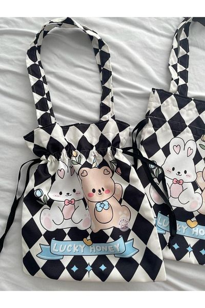 Planet Butik حقيبة قماش برباط من Lucky Honey