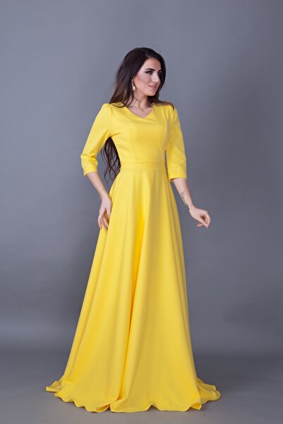 NO48 Κίτρινο βραδινό φόρεμα με φουσκωτό ύφασμα με λαιμόκοψη 3/4 με υφαντό ύφασμα