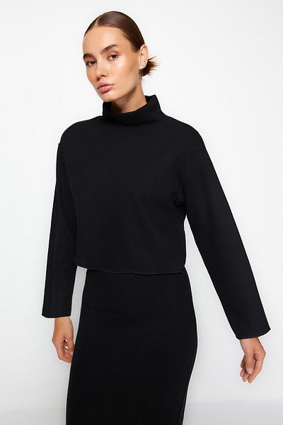 Trendyol Collection Schwarze Strickbluse im Thessaloniki-/Strickwaren-Look, hoher Kragen, entspannte/bequeme Passform, niedrige Ärmel, TWOAW24BZ00092