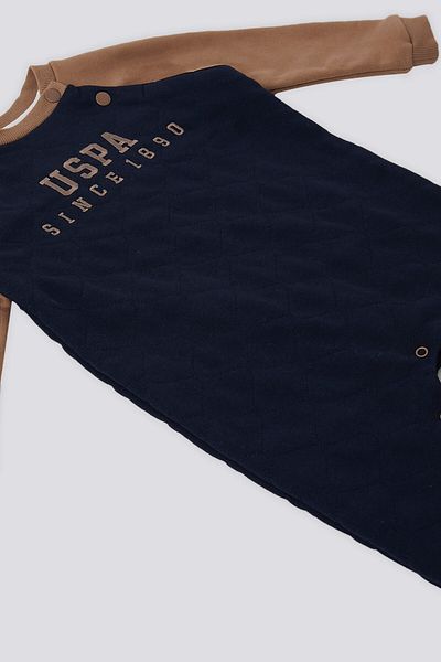 U.S. Polo Assn. بذلة أطفال باللون الأزرق الداكن من U.S. Polo Assn