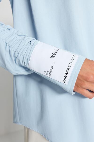 Trendyol Collection Sagaza Studio ανοιχτό μπλε πουκάμισο από ποπλίνα - λεπτομέρεια με κορδόνι, υφαντό TPRAW22GO1191