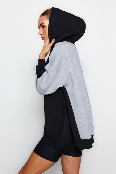 Trendyol Collection Grau meliertes Farbblock-Fleece-Strick-Sport-Sweatshirt mit breiter Passform TWOSS22SW0074